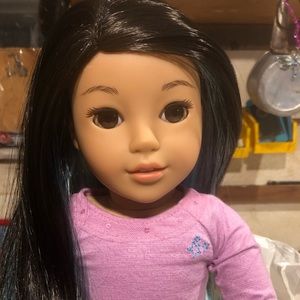 This is Corrine, she is the girl of the year 2022 in good  condition.